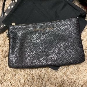 Clutch wallet comes with battery phone charger